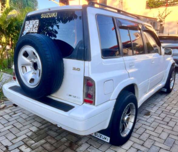 Vendo bonita vagoneta japonesa suzuki escudo 97 4x4 cel 75018362  motor en linea 2000cc / automatica vidrios eléctricos aros de magnesio 5 puertas en el precio 86000 bs incluye el cambio de nombre164022144