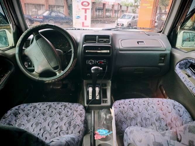 Vendo bonita vagoneta japonesa suzuki escudo 97 4x4 cel 75018362  motor en linea 2000cc / automatica vidrios eléctricos aros de magnesio 5 puertas en el precio 86000 bs incluye el cambio de nombre1995916572