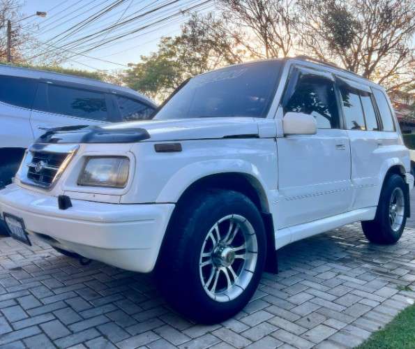 Vendo bonita vagoneta japonesa suzuki escudo 97 4x4 cel 75018362  motor en linea 2000cc / automatica vidrios eléctricos aros de magnesio 5 puertas en el precio 86000 bs incluye el cambio de nombre164022144