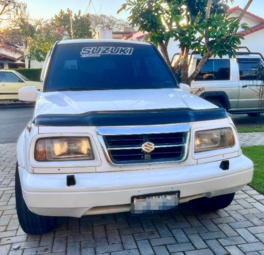 Vendo bonita vagoneta japonesa suzuki escudo 97 4x4 cel 75018362  motor en linea 2000cc / automatica vidrios eléctricos aros de magnesio 5 puertas en el precio 86000 bs incluye el cambio de nombre164022144