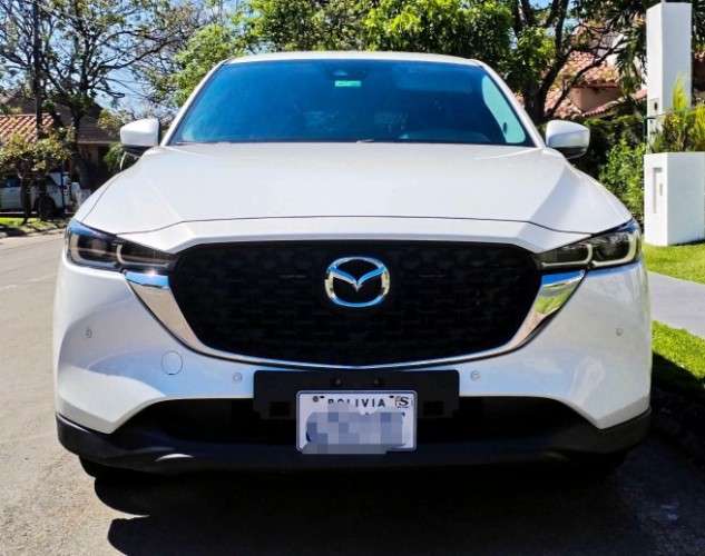Vendo o permuto vagoneta mazda cx5 2024 de imcruz cel 75018362 version full 4x4 caja automatica motor 2000 3 modos de manejo eco normal y sport pisos bandeja  equipo bosse original de fabrica aros bi tono originales 19 camara de retro radio cardplay e222304197