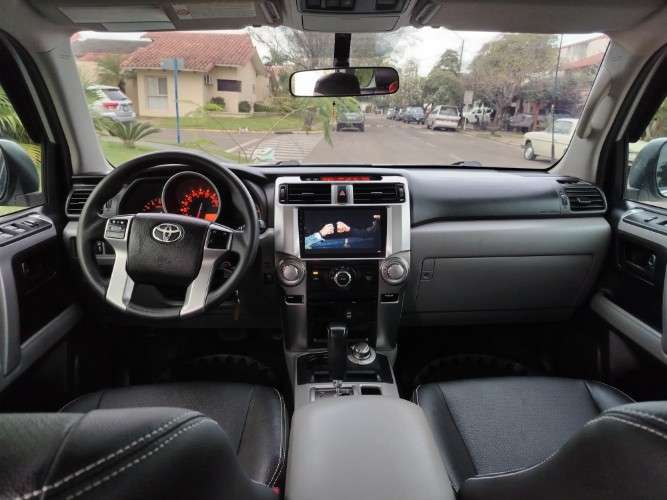Vendo toyota runner 2013 de toyosa impecable cel 75018362 3 filas de asiento 4x4 radio android cámara de retro pisos bandeja llantas nuevas perfecto estado1113764078