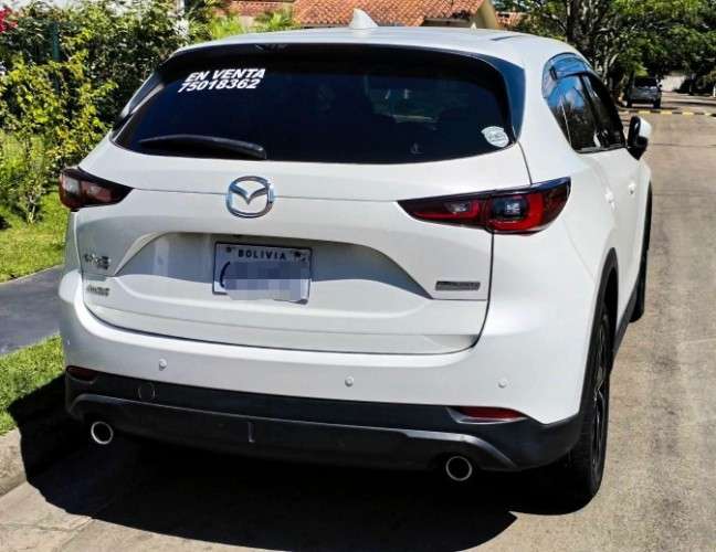Vendo o permuto vagoneta mazda cx5 2024 de imcruz cel 75018362 version full 4x4 caja automatica motor 2000 3 modos de manejo eco normal y sport pisos bandeja  equipo bosse original de fabrica aros bi tono originales 19 camara de retro radio cardplay e222304197